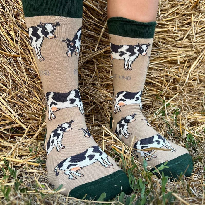 model wearing cow bamboo socks