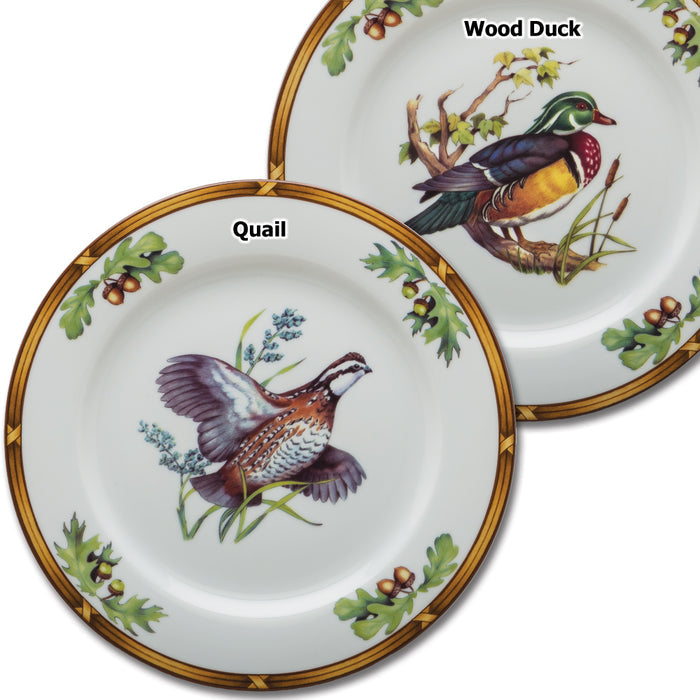 Two 9-inch porcelain luncheon plates featuring detailed quail and wood duck illustrations with acorn and oak leaf borders.