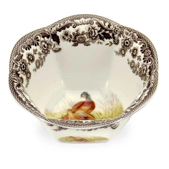 Spode Woodland 6-inch porcelain nut bowl featuring a colorful pheasant illustration and a brown British Flowers border.