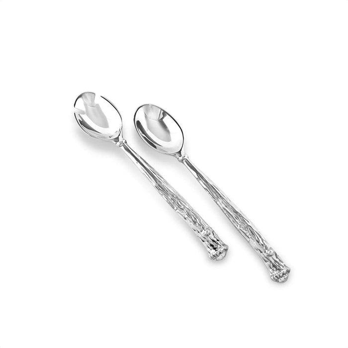 Beatriz Ball silver aluminum salad servers with rustic, textured antler-inspired handles and polished bowls.