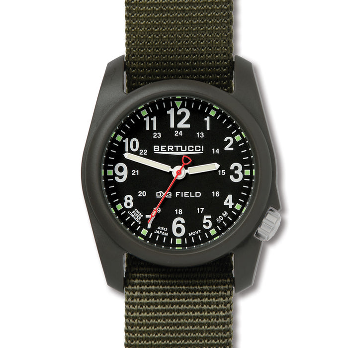 Bertucci DX3 field watch with a black 40mm poly-resin case, black dial, and olive green nylon strap.