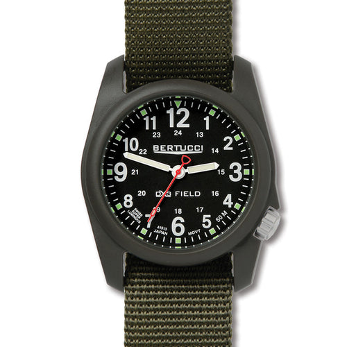 Bertucci DX3 field watch with a black 40mm poly-resin case, black dial, and olive green nylon strap.