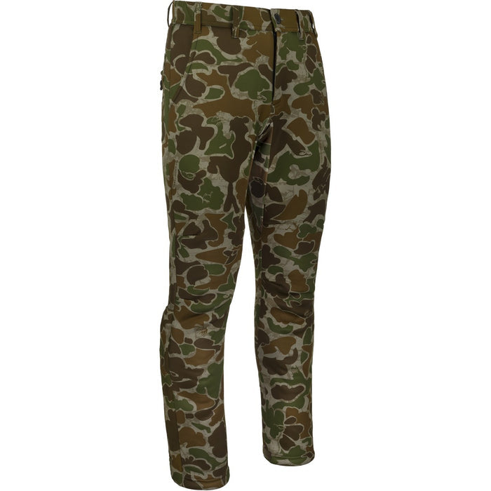 Drake MST Ultimate Wader Pants in camouflage print with articulated knees and stretch fabric for hunting.