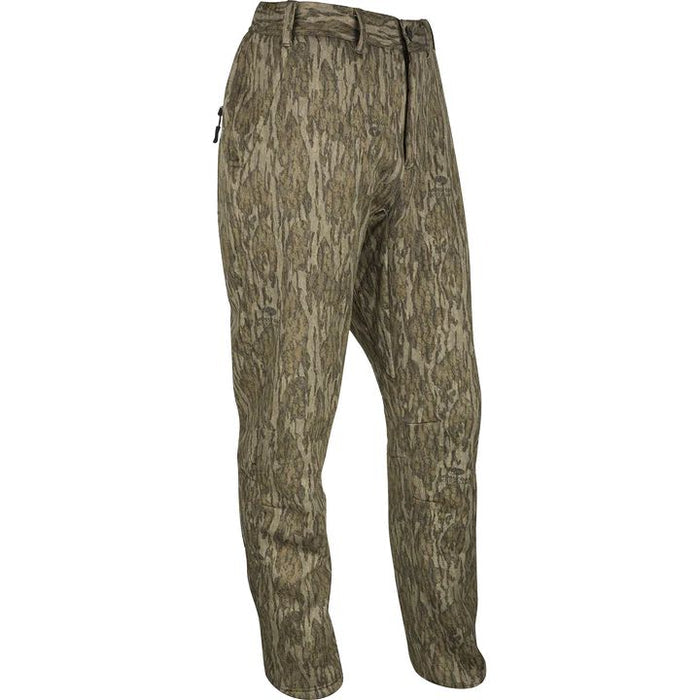 Drake MST Ultimate Wader Pants in camouflage print with articulated knees and stretch fabric for hunting.