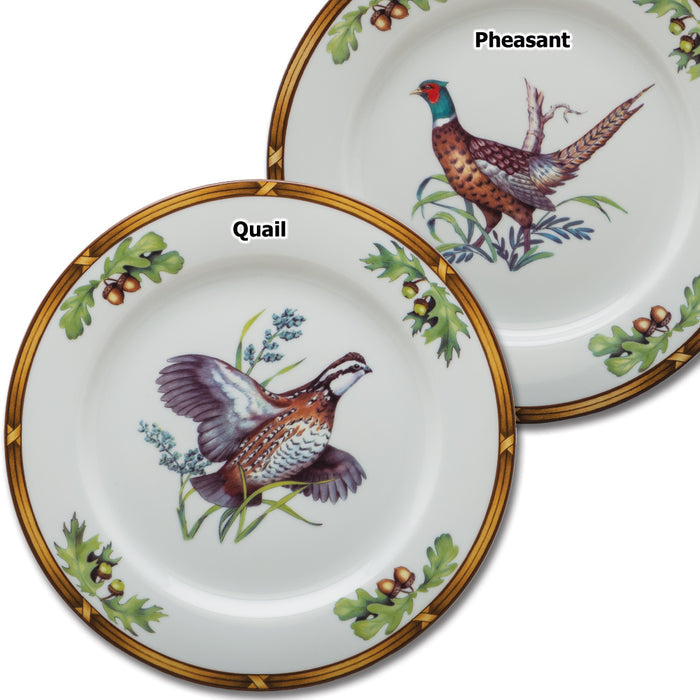 Julie Wear porcelain dinner plates featuring quail and pheasant illustrations with oak leaf and acorn borders.