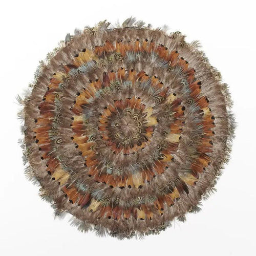 16-inch round placemat handcrafted from iridescent pheasant feathers in shades of brown, grey, black, and green.