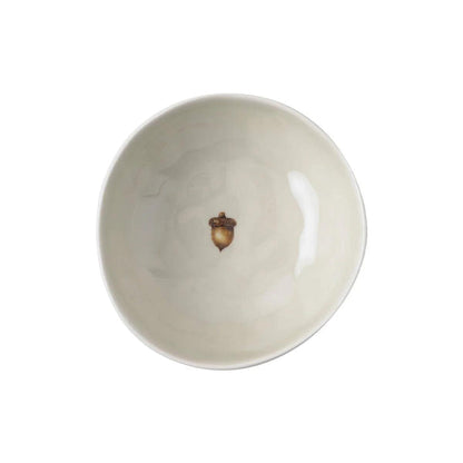 Cream-colored ceramic stoneware bowl with a central acorn motif, 5.5-inch diameter, elegant rustic design.