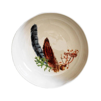 Juliska Forest Walk 8.5-inch ceramic coupe bowl featuring a woodland-themed squirrel tail and mushroom illustration.