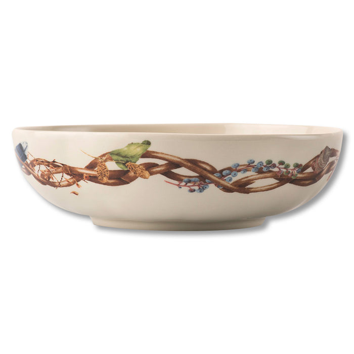 Juliska Forest Walk 8.5-inch ceramic coupe bowl featuring a woodland vine, berry, and leaf pattern on an off-white base.