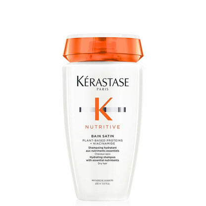 Kérastase Nutritive Bain Satin 250ml white shampoo bottle with orange cap on white, formulated to hydrate and nourish dry hair