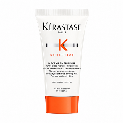Kérastase Nutritive Nectar Thermique 50ml white tube with orange cap on white, an anti-frizz blow-dry milk for dry, medium-to-thick hair.