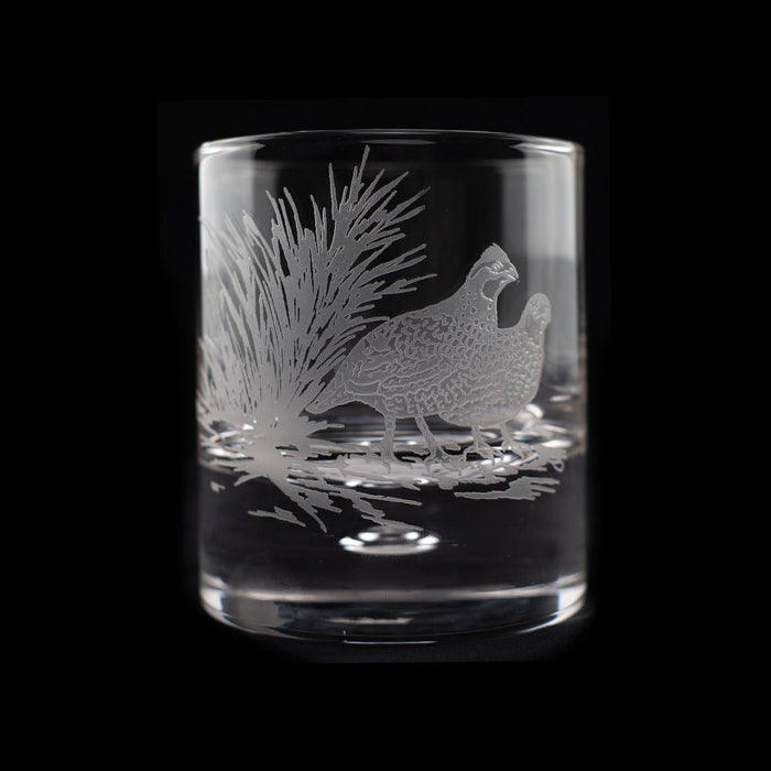 11oz crystal old fashioned glass featuring a detailed sand-etched quail and grass design on a clear glass surface.