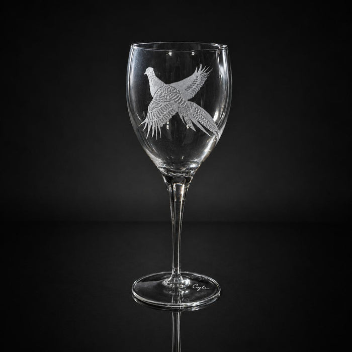 11 oz crystal white wine glass featuring a detailed, hand-etched pheasant design on a clear glass stemware piece.