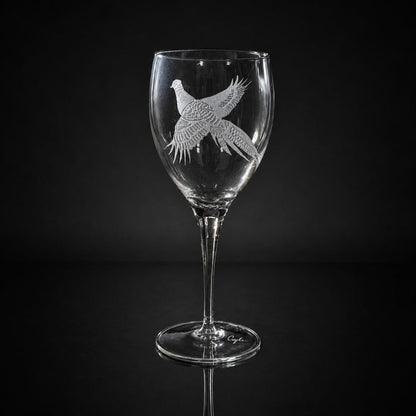 11 oz crystal white wine glass featuring a detailed, hand-etched pheasant design on a clear glass stemware piece.