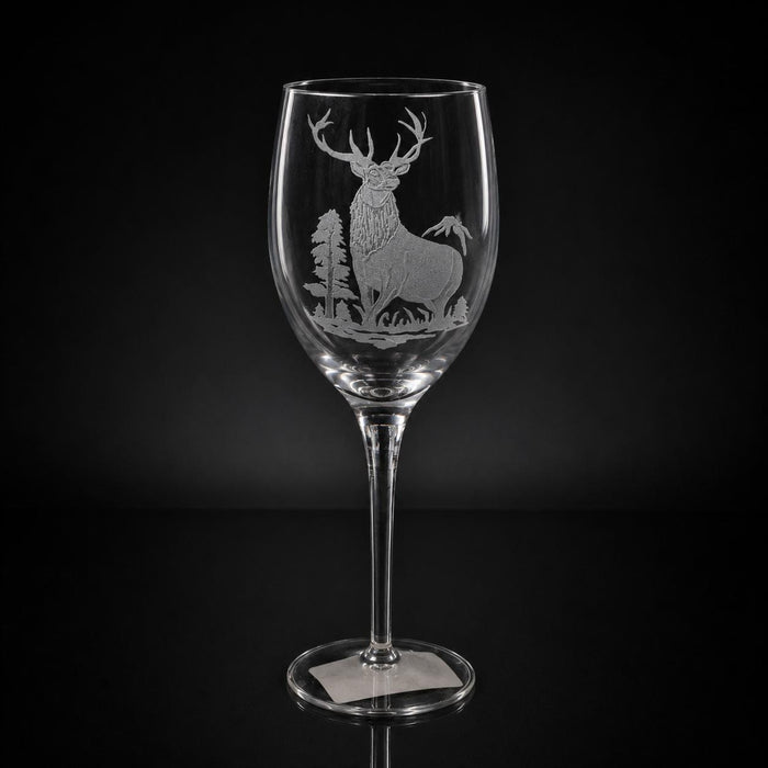 11 oz white wine glass featuring a hand-etched, multi-layered elk design on clear crystal against a black background.