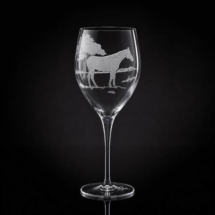 11 oz crystal white wine glass featuring a hand-etched horse design on a clear glass against a black background.