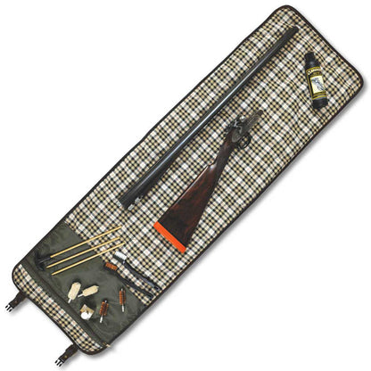 Unrolled canvas and mahogany leather cleaning kit with quilted tattersall lining, brass hardware, and organized tool pockets.