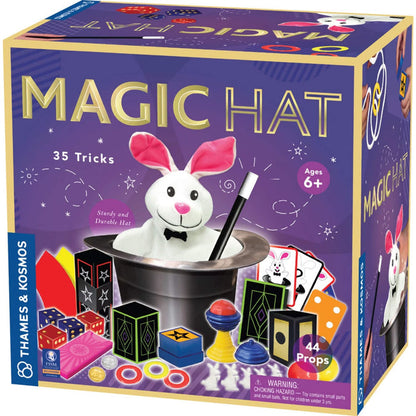 Box of 'Magic Hat' toy set with rabbit in hat and props on a purple background