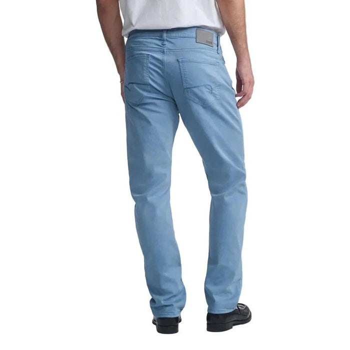 Back view of Mavi Men's Zach straight leg light blue twill stretch jeans with back pockets and a leather waist patch.