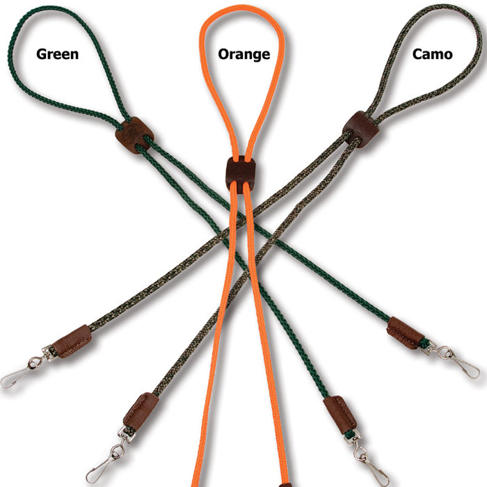 Mendota double whistle lanyards in green, orange, and camo with braided polypropylene cord, leather slides, and metal clips.