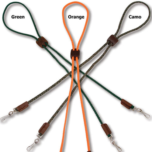 Mendota double whistle lanyards in green, orange, and camo with braided polypropylene cord, leather slides, and metal clips.