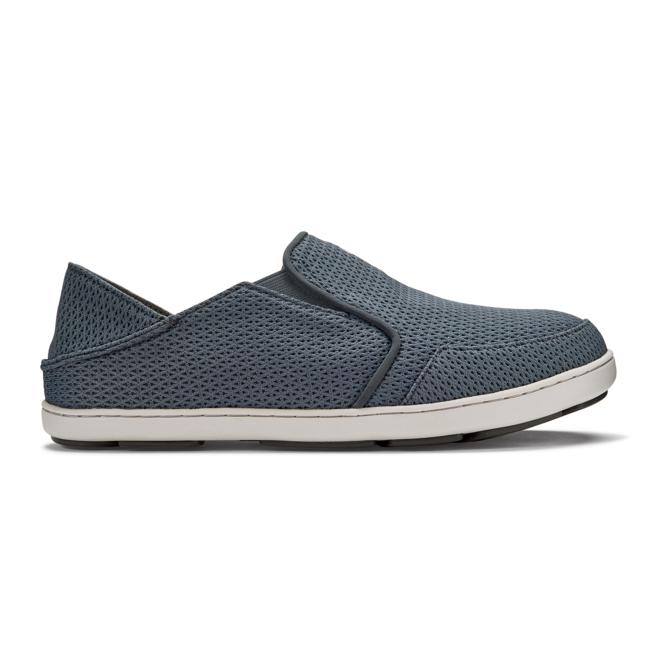 OluKai Nohea men's slip-on shoes in blue breathable mesh with a white non-marking rubber sole and collapsible heel.