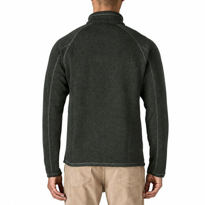 Back view of a charcoal grey Patagonia Better Sweater 1/4 zip fleece pullover with raglan sleeves and flat-seam detailing.