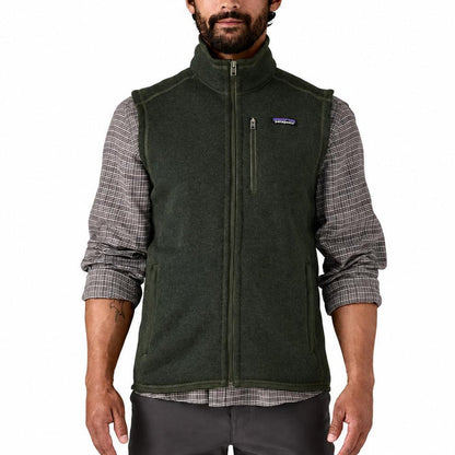 Man wearing a dark green Patagonia Better Sweater fleece vest with a full-zip front and chest pocket.