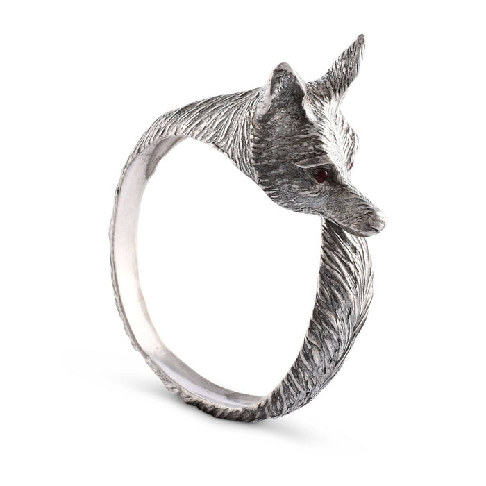 Detailed pewter napkin ring featuring a sculpted fox head with red eyes and a textured, flowing tail design.