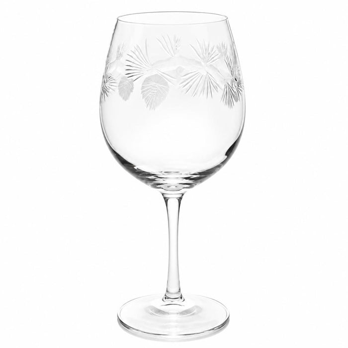 18 oz balloon red wine glass featuring an etched frosted pinecone and pine needle design on clear glass.
