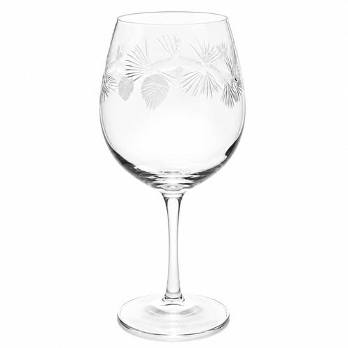 18 oz balloon red wine glass featuring an etched frosted pinecone and pine needle design on clear glass.