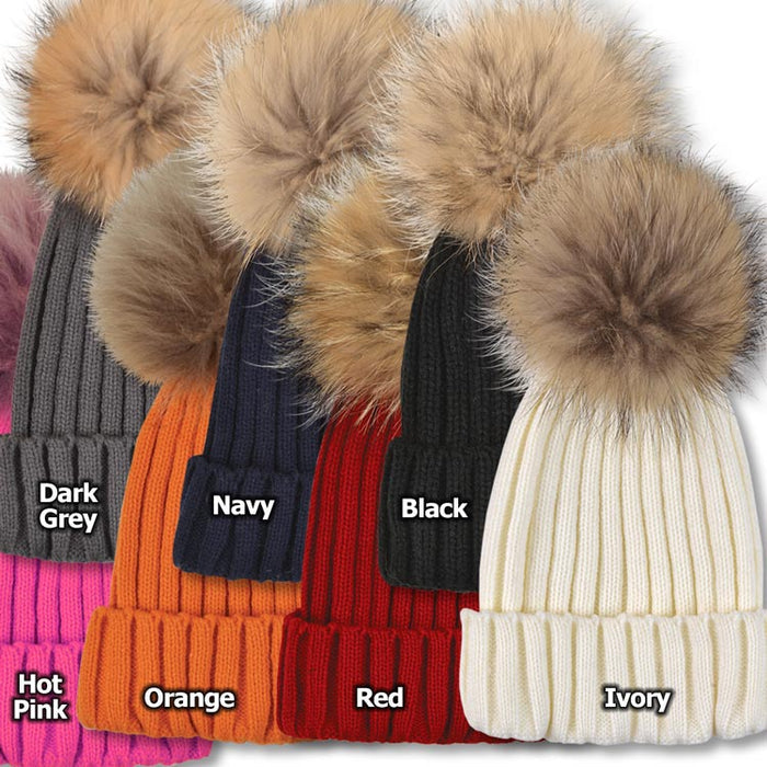 Collection of ribbed acrylic beanies in various colors, each topped with a detachable, fluffy real raccoon fur pom-pom.