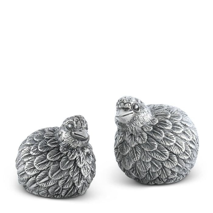Detailed pewter quail salt and pepper shakers with intricate feather textures, standing 2 to 3 inches tall.