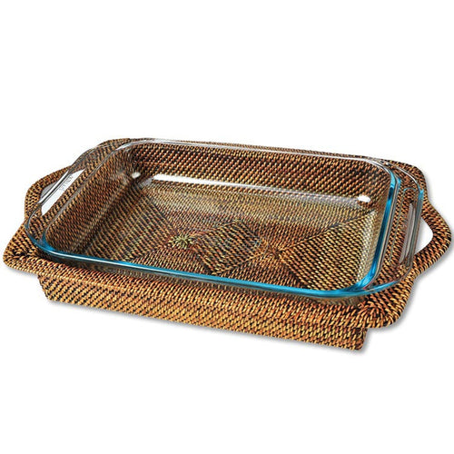 Rectangular 3-quart Pyrex casserole dish set in a handwoven, artisanal brown watervine wicker holder.