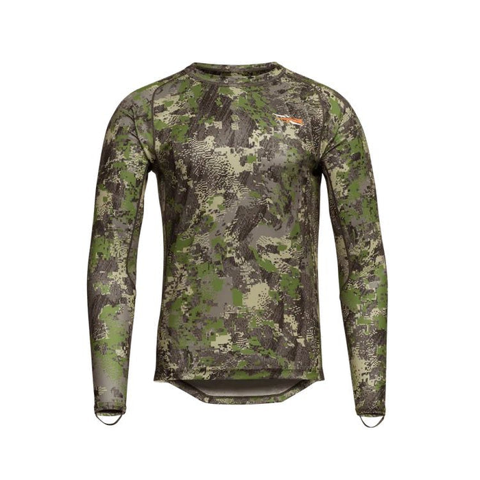 Sitka Core Lightweight long sleeve crew base layer in forest camouflage print with a small logo on the chest.
