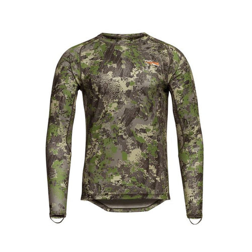 Sitka Core Lightweight long sleeve crew base layer in forest camouflage print with a small logo on the chest.