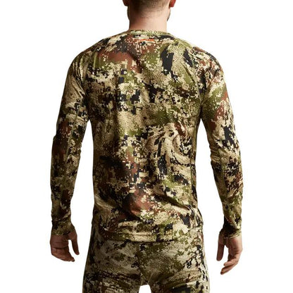 Back view of a Sitka Core Lightweight long sleeve crew shirt in camouflage print, featuring moisture-wicking stretch fabric.