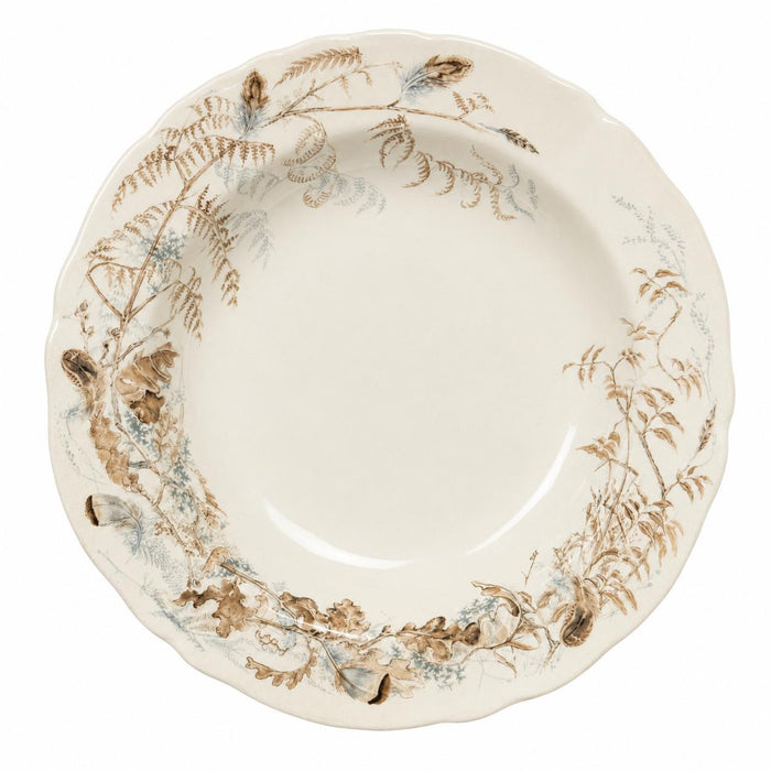 Sologne 9-inch rimmed soup bowl in cream china with detailed brown and blue fern, feather, and acorn illustrations.