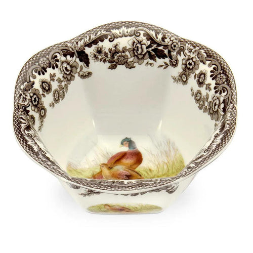 Spode Woodland 6-inch porcelain nut bowl featuring a colorful pheasant illustration and a brown British Flowers border.