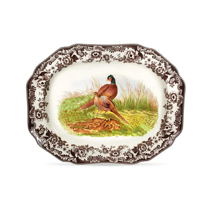 Spode Woodland 19-inch oval ceramic platter featuring two pheasants in a meadow with a brown floral border.