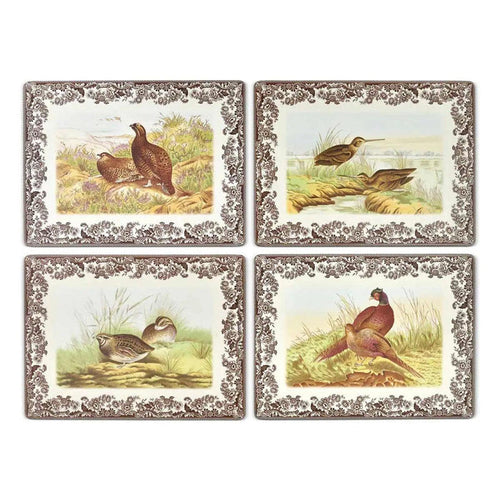 Set of four rectangular Spode Woodland placemats featuring gamebird illustrations with brown floral borders and cork backing.
