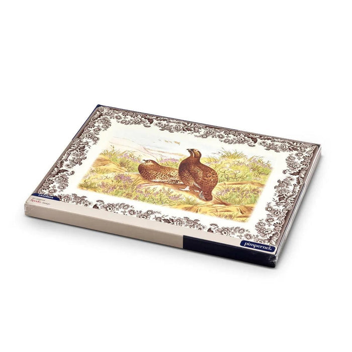 Spode Woodland rectangular placemats featuring a gamebird design with a decorative brown floral border and cork backing.
