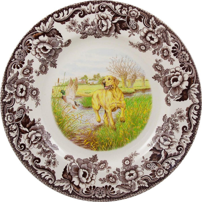 Spode Woodland 10.5-inch dinner plate featuring a Yellow Lab in a field with a brown floral border on cream china.