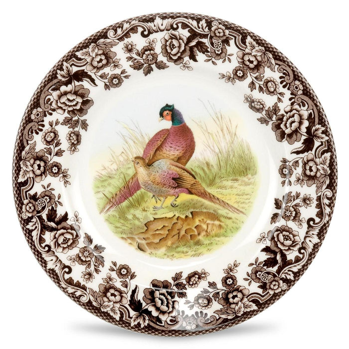 Spode Woodland 8-inch salad plate featuring a pheasant motif and a brown floral archival border on white ceramic.