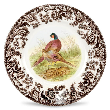 Spode Woodland 8-inch salad plate featuring a pheasant motif and a brown floral archival border on white ceramic.