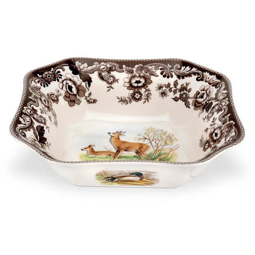 Spode Woodland 9.5-inch square earthenware serving bowl featuring deer and bird illustrations with a brown floral border.