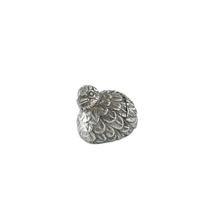 Detailed silver pewter quail place card holder with intricate feather textures, measuring 3 inches long.